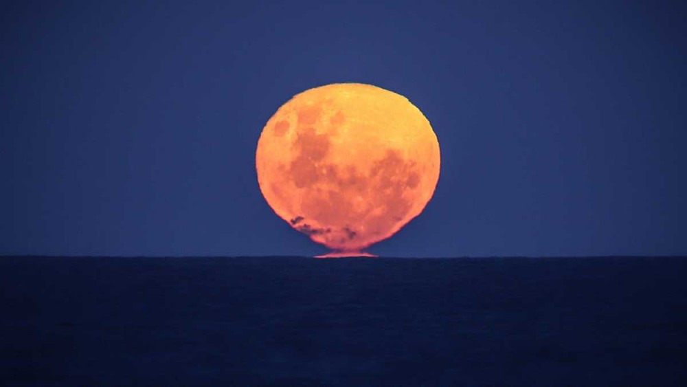 It's your last chance to see a supermoon this year with the 'strawberry